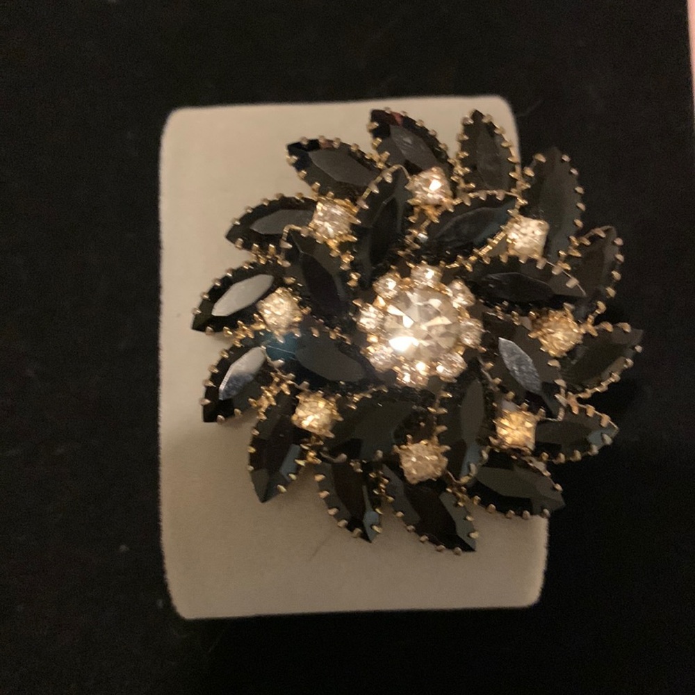Black and rhinestone brooch